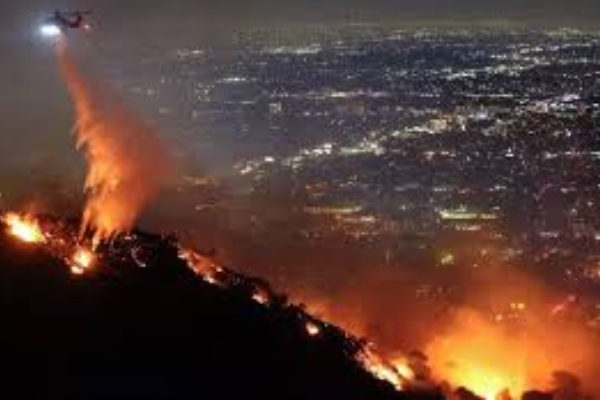 100,000 people ordered to evacuate as Los Angeles wildfires spread to Hollywood